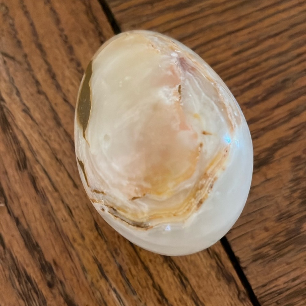 Light beige/brown polished stone egg booth